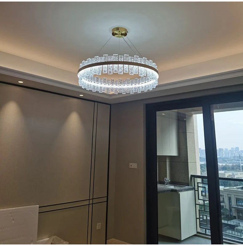 Chandelier hanging from the ceiling in a modern interior setting.