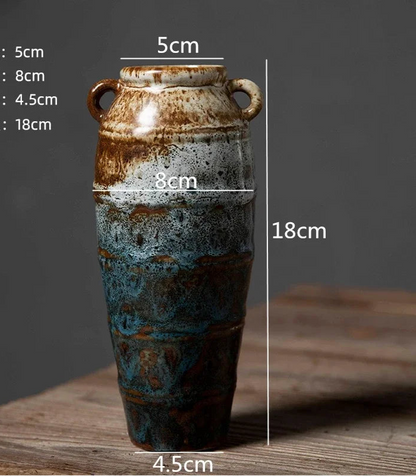 Ceramic vase with measurement labels on a wooden surface