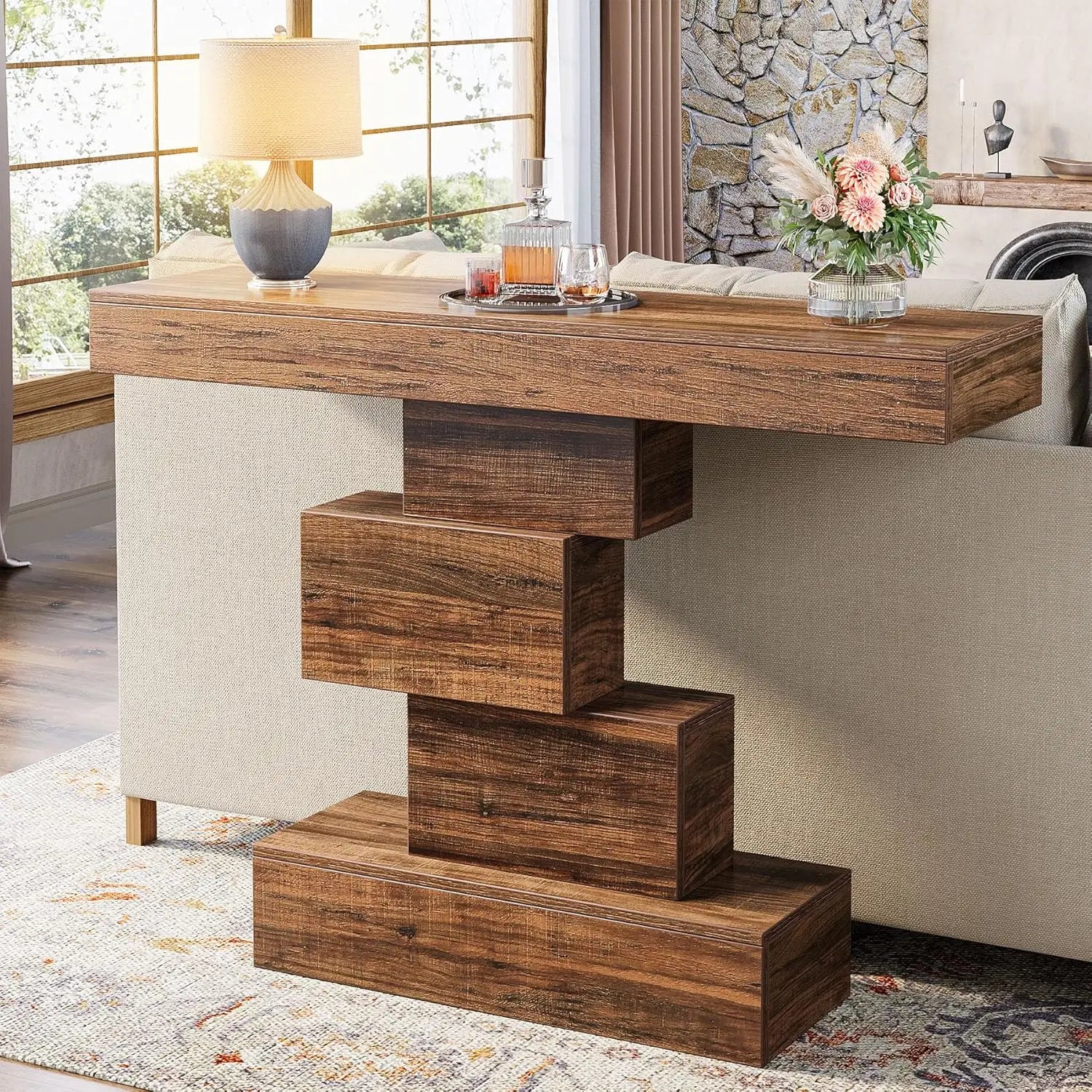 Wooden console table in a living room setting with decor items.