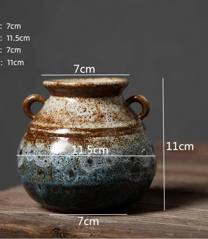 Ceramic vase with measurement labels on a dark background